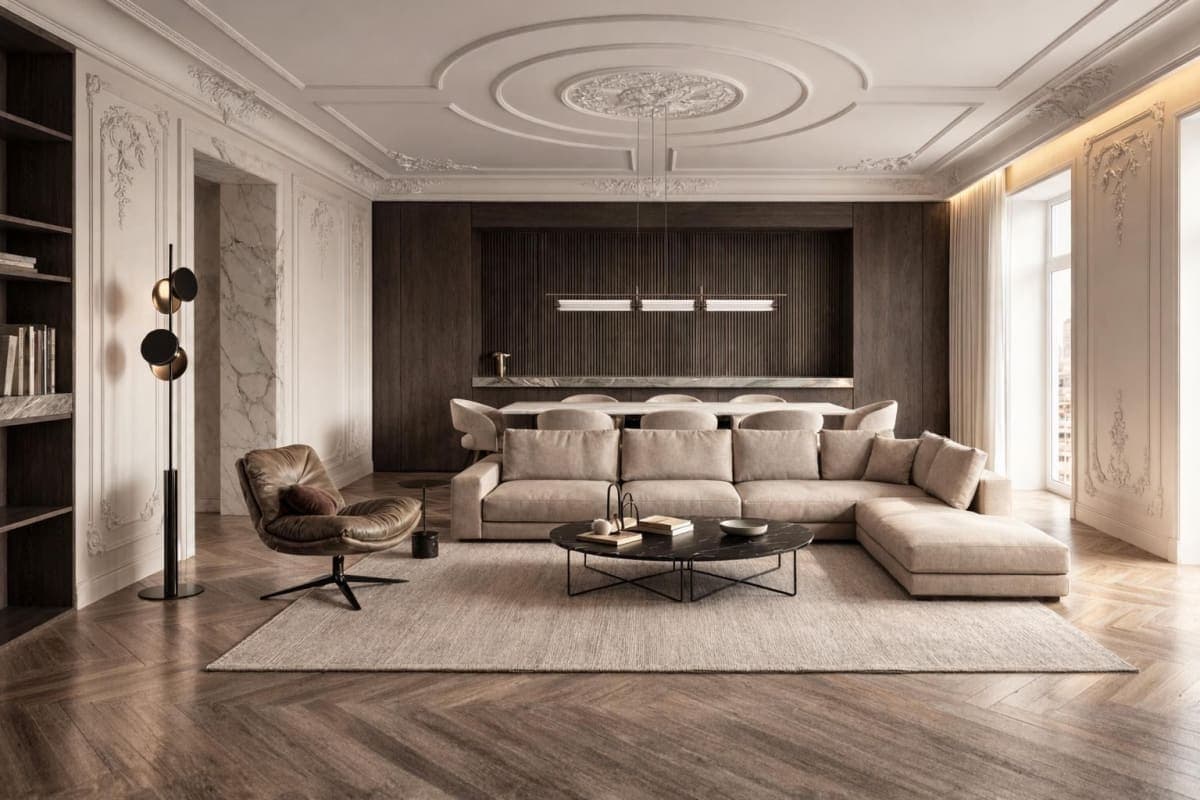 Salón con techos labrados ornamentados, panel de madera oscura y parquet en espiga en propiedad reformada en la calle Alcalá, Madrid — Coco House